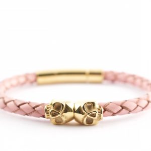 gold twin skull bracelet pink